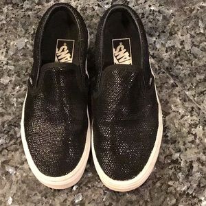 Black Vans slip on